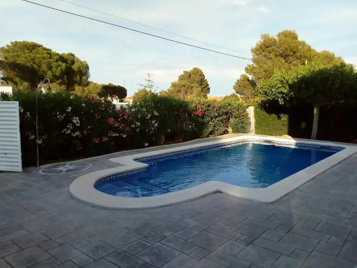 Calafat Seaside Villa: Beachfront Retreat with Pool and Sea Views Spain